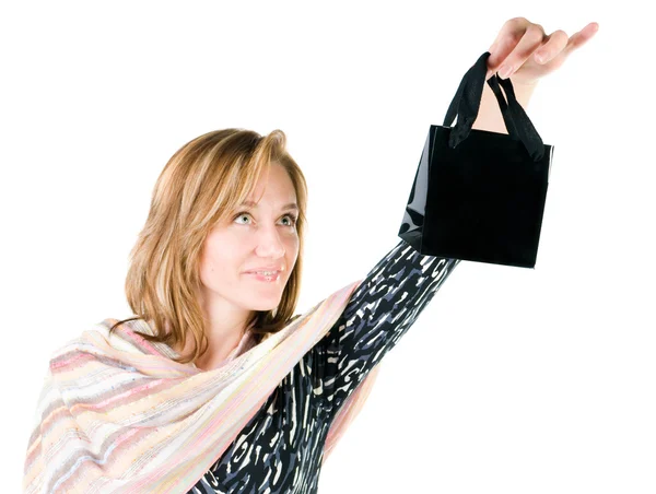 Glad ung kvinna med shopping väska — Stockfoto