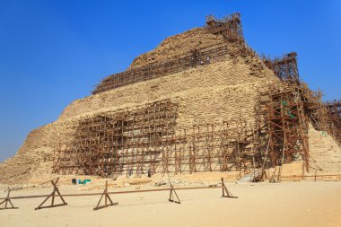 Restoration of the pyramid of Djoser, Saqqara, Egypt clipart