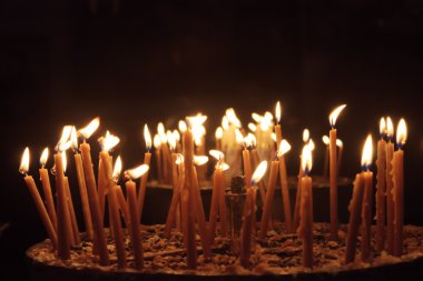 Candles in the Church of the Nativity, Bethlehem, Palestine clipart