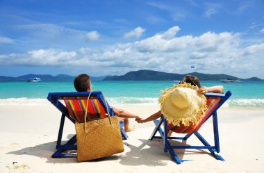 Couple on a beach clipart