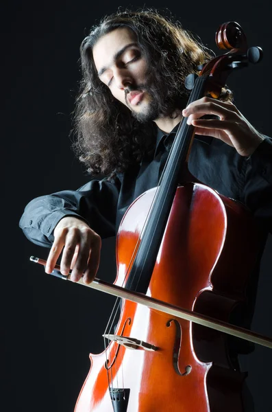 Muž hraje na violoncello — Stock fotografie