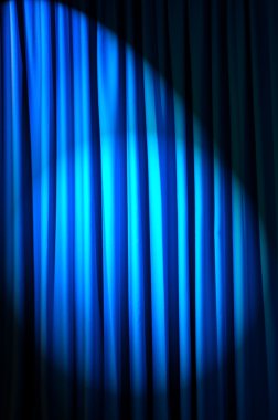 Brightly lit curtains in theatre concept clipart