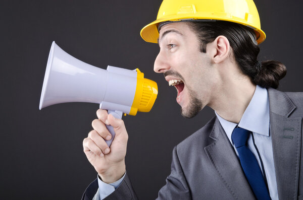 Man shouting and yelling with loudspeaker