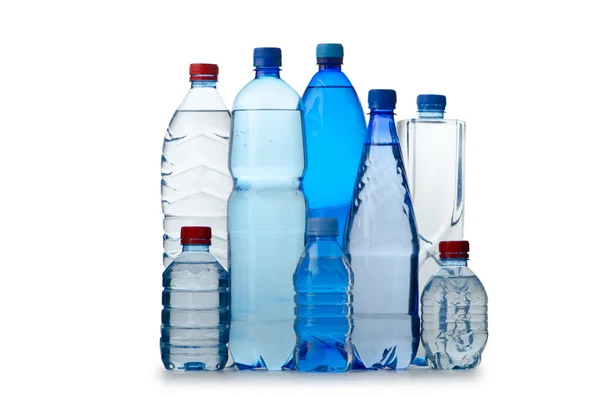 stock image Drinking Water in bottles on white