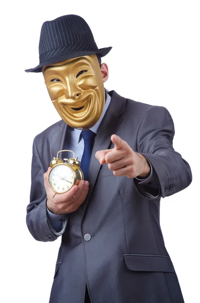 Человек в маске с часами на белом — стоковое фото