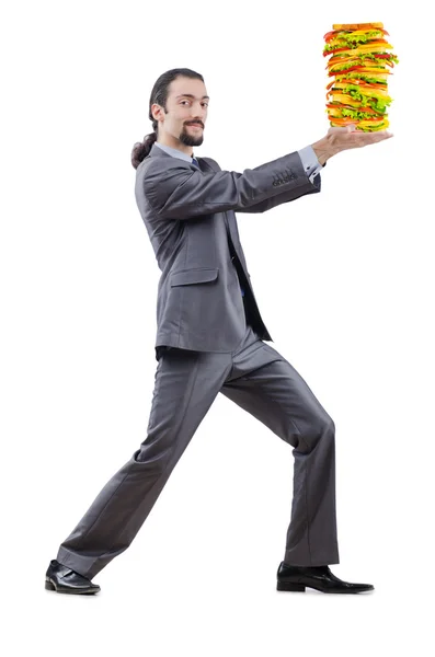 Άνθρωπος και γίγαντας σάντουιτς σε λευκό — Φωτογραφία Αρχείου