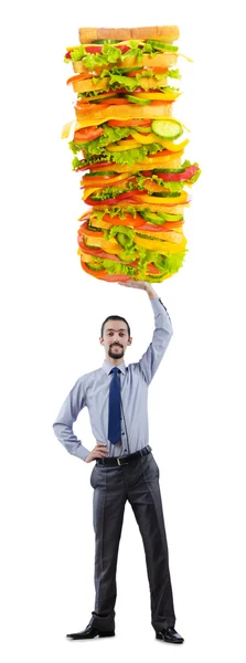माणूस आणि पांढरा वर राक्षस सँडविच — स्टॉक फोटो, इमेज
