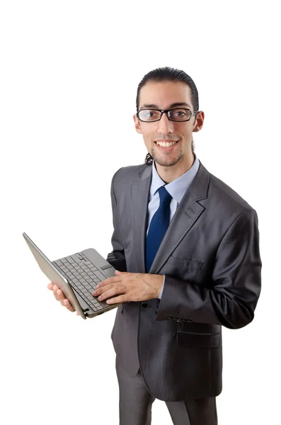Бизнесмен работает над ноутбуком Лицензионные Стоковые Изображения