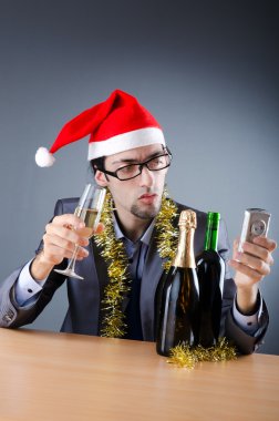 Drunken businessman after office christmas party clipart