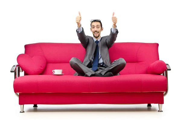 Чоловік сидить у дивані — стокове фото