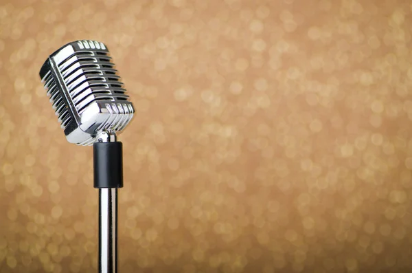 stock image Old vintage microphone on background