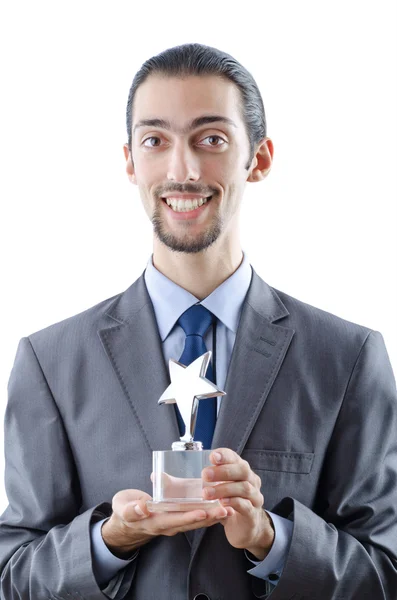Businessman with award on white — Stock Photo, Image