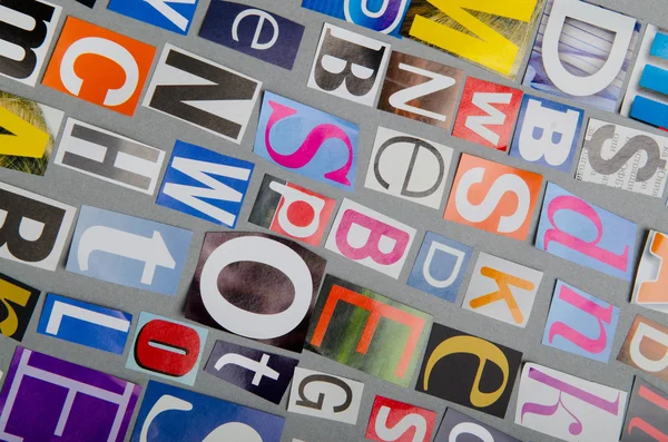 Cut letters from newspapers and magazines — Stock Photo, Image