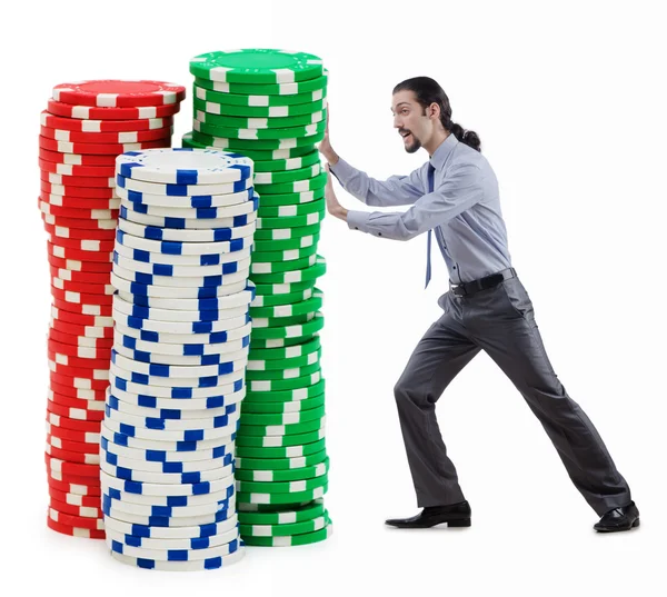 Podnikatel a kasino čipy na bílém pozadí — Stock fotografie