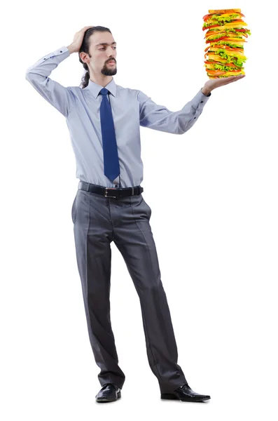 Człowiek i gigant kanapkę na biały — Zdjęcie stockowe