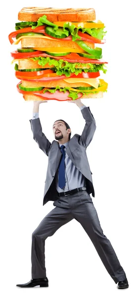 Człowiek i gigant kanapkę na biały — Zdjęcie stockowe