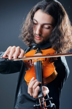 Violin player playing the intstrument clipart