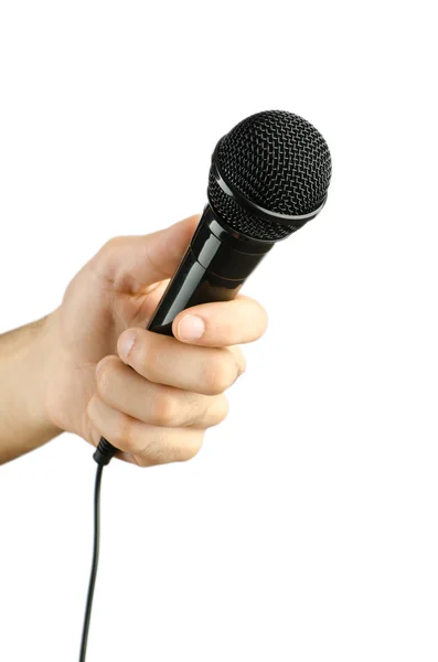 Hand innehav mikrofon på vit — Stockfoto