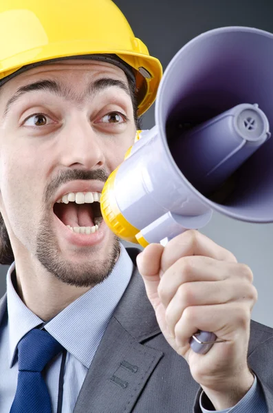 Man shouting and yelling with loudspeaker — Stock Photo, Image