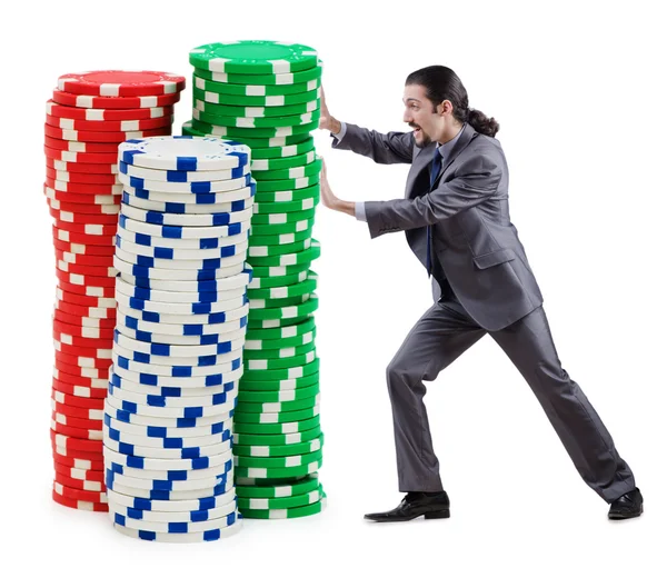 Businessman and casino chips on white — Stock Photo, Image