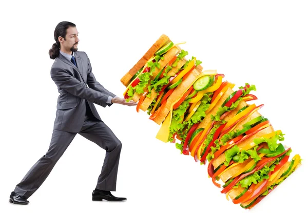 Man and giant sandwich on white — Stock Photo, Image