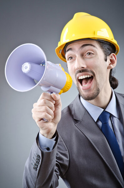 Man shouting and yelling with loudspeaker