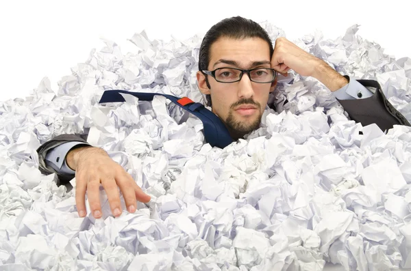 Muž se spoustou papírového odpadu — Stock fotografie