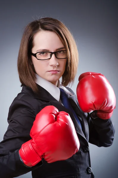 Young businesswoman in boxing concept — Stock Photo, Image