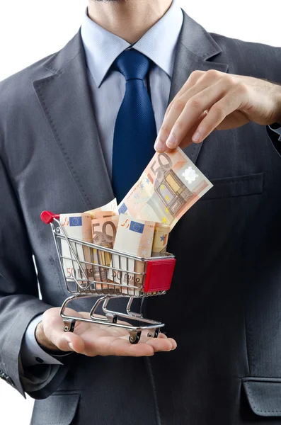 Shopping cart full of money — Stock Photo, Image