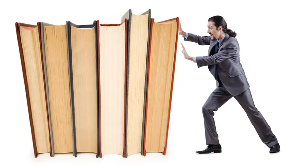 Businessman with books on white — Stock Photo, Image