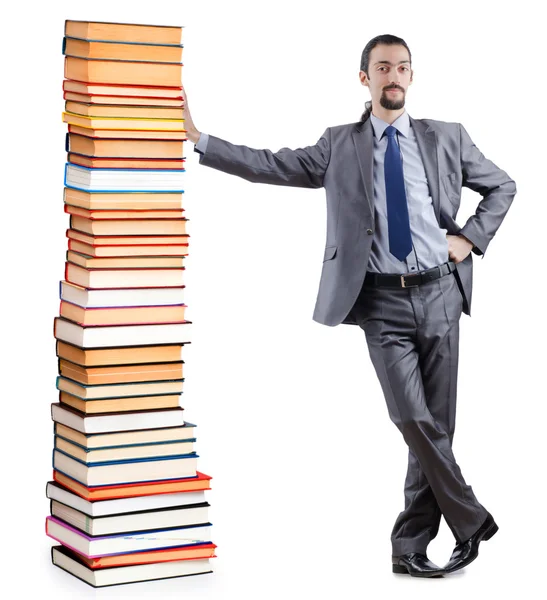 Uomo d'affari con libri sul bianco — Foto Stock