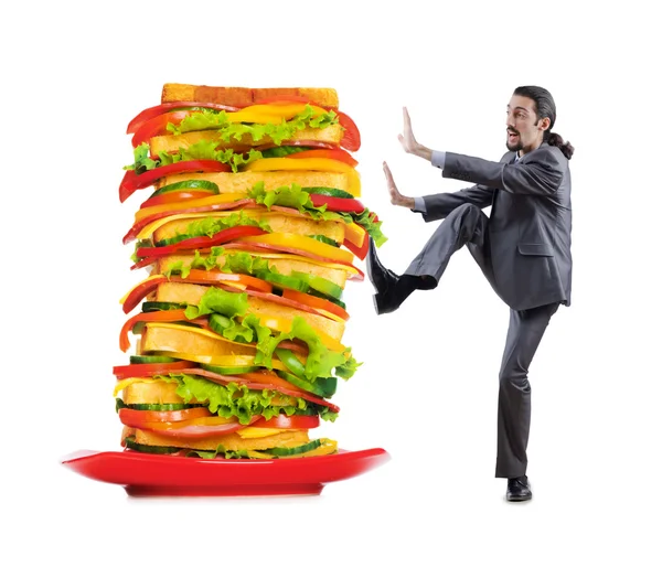 stock image Man and giant sandwich on white