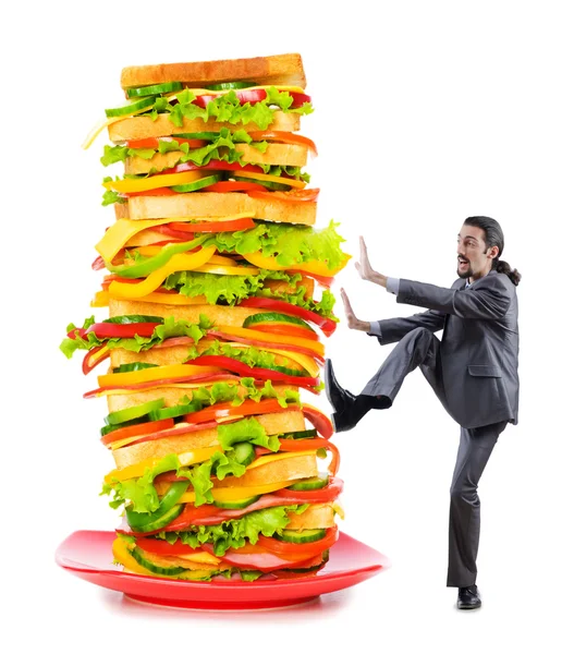 stock image Man and giant sandwich on white