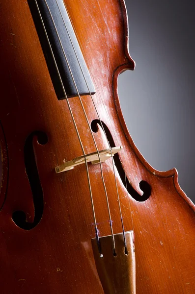 Music Cello in the dark room Royalty Free Stock Images