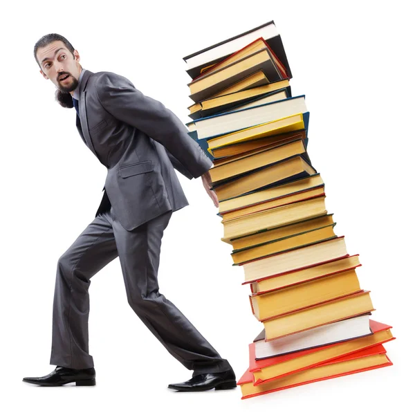Businessman with books on white Stock Picture
