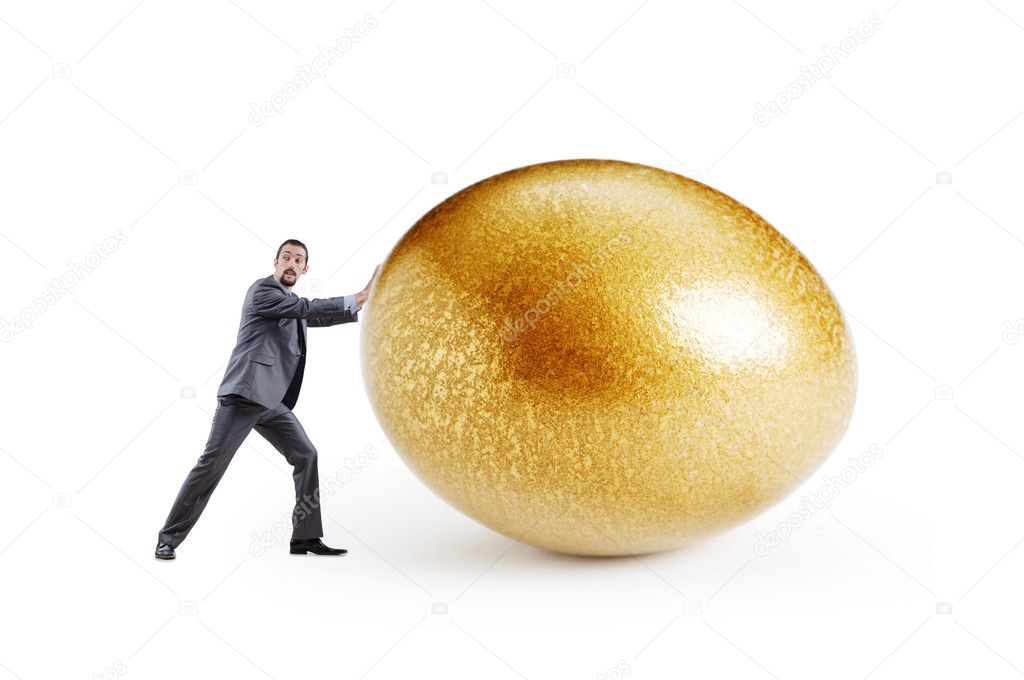 Man and golden egg isolated on white