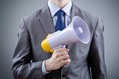 Man shouting and yelling with loudspeaker clipart