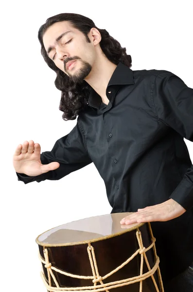 Perkusista z drum gry na biały — Zdjęcie stockowe