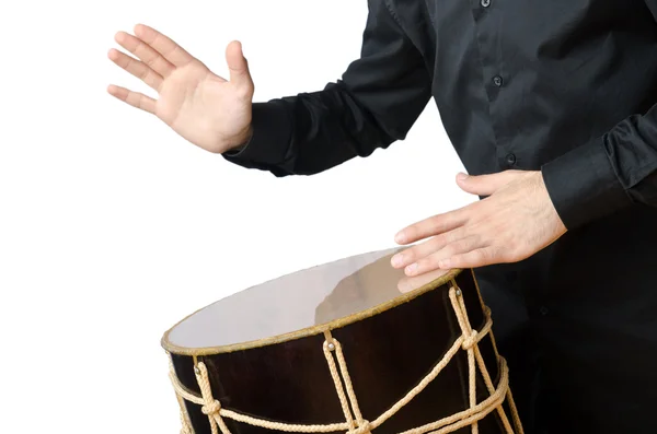 Drummer with drum playing on white — Stock Photo, Image