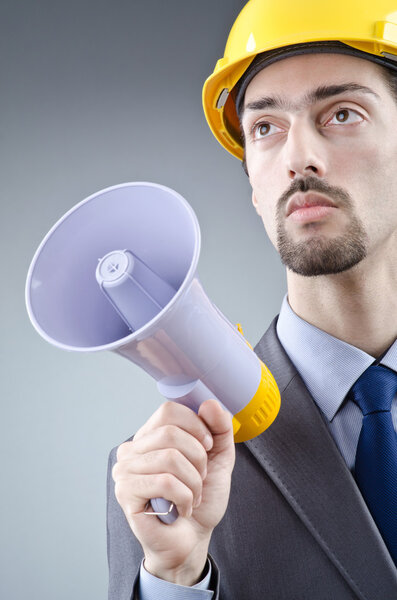 Man shouting and yelling with loudspeaker