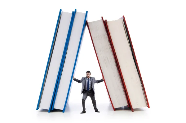 Empresario con libros sobre blanco —  Fotos de Stock
