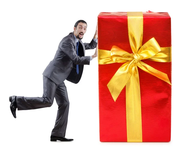 Бизнесмен с подарочными коробками на белом — стоковое фото