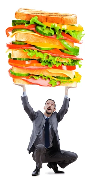 Чоловік і гігантський бутерброд на білому — стокове фото