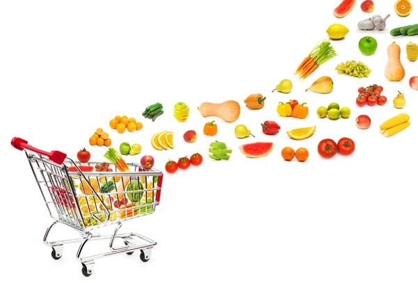 Food products flying out of shopping cart — Stock Photo, Image