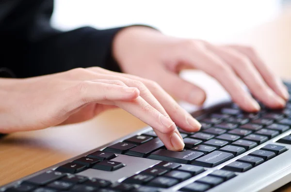 Hands typing on the keyboard — Stock Photo, Image