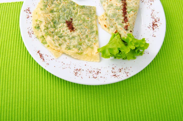 Herb stuffed pancaces in the plate — Stock Photo, Image