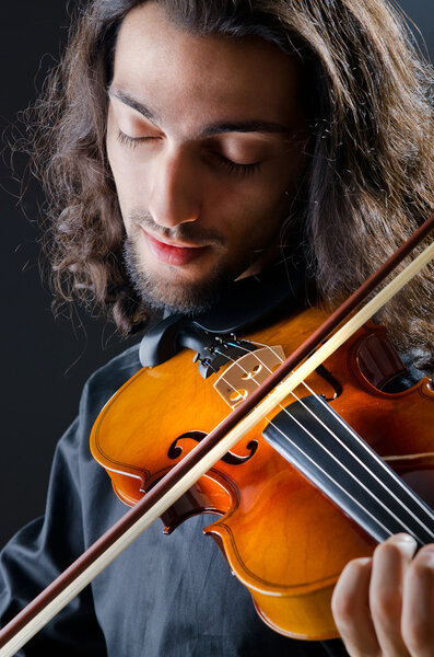 Violin player playing the intstrument