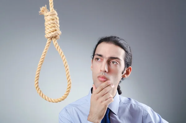 Affärsman att begå självmord genom hängande — Stockfoto