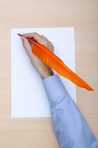 Man with quill writing — Stock Photo, Image