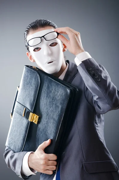 Průmyslové espionate koncept s maskovaný podnikatel — Stock fotografie